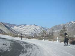 Men on Sayan mountain road